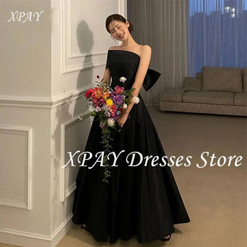 客製款黑色緞面蝴蝶結露背禮服｜一字領A字裙 拍照／婚禮／宴會用