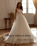 簡約A字薄紗婚紗/ 方領吊帶無袖立體花飾 新娘禮服/ 拖尾定制款 - WeddLin 輕婚紗